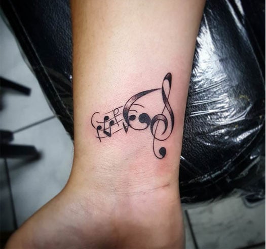 21 Minimalist And Small Tattoo Designs With Meanings  Small music tattoos  Cool small tattoos Minimalist tattoo