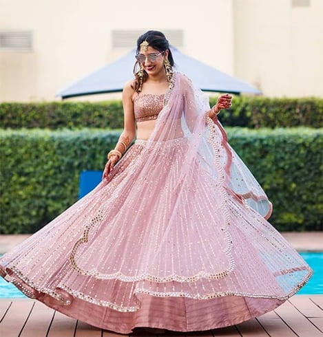 10 Peach Lehenga Choli Designs That Can Turn On The Right Attention